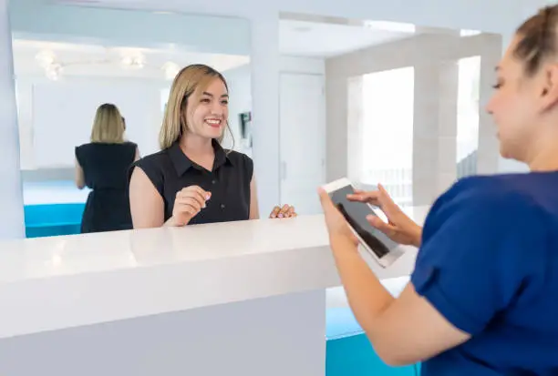How Dental Virtual Receptionists Handle Repetitive Questions Without Sounding Scripted